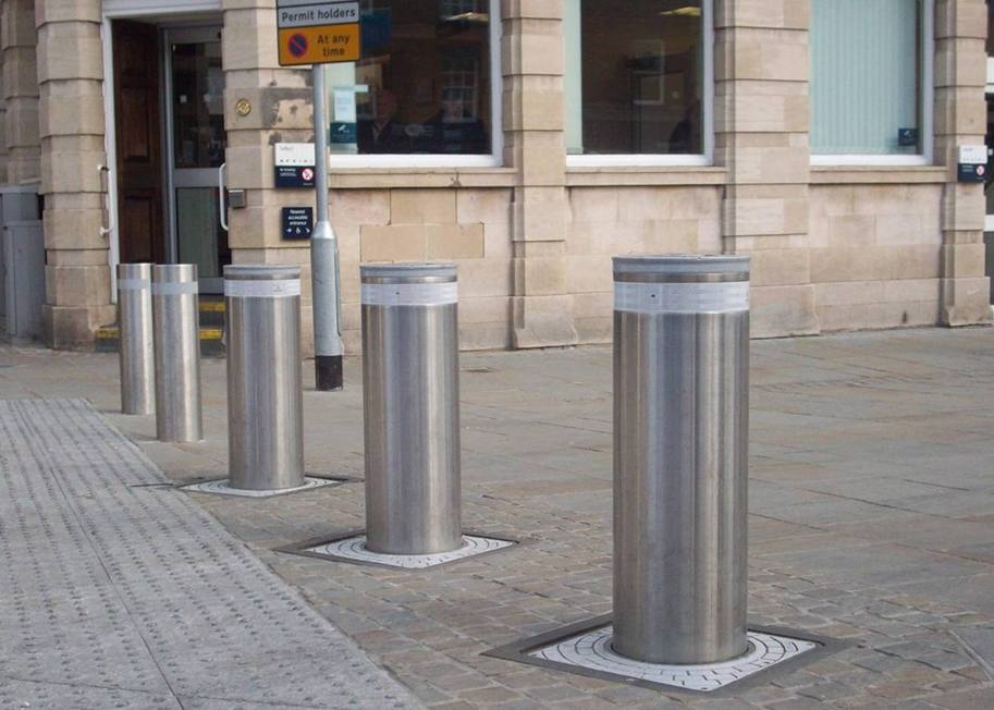 Stainless Steel Security Bollards Along Urban Pedestrian Walkway